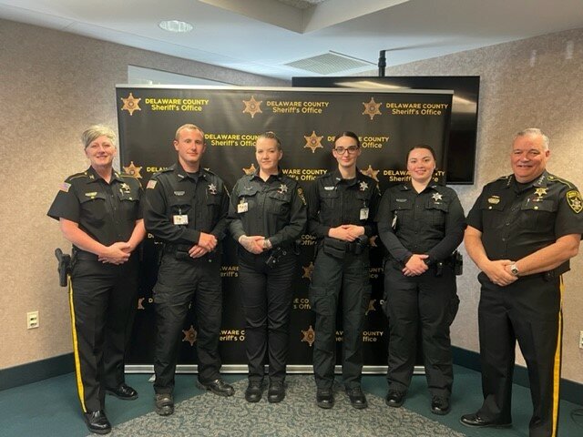 Recent correction officer academy graduates include Hannah Charles, Elizabeth Cherry, Nicholas Empara and Bethany Schoonmaker, pictured with Delaware County Undersheriff Kim Smith and Sheriff Craig DuMond.